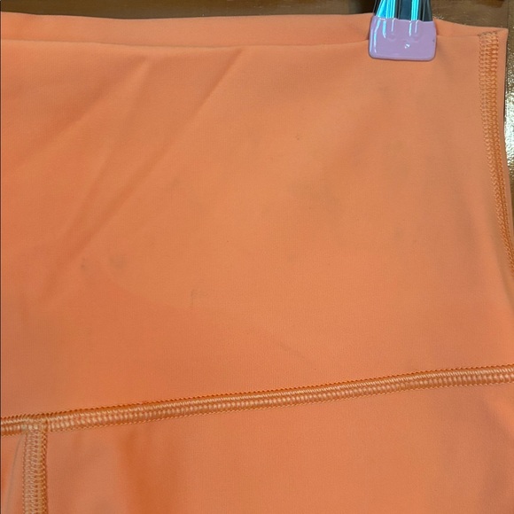 Lululemon wunder under high rise tight 25” in orange soda *flaw* - Picture 3 of 6
